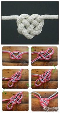 the instructions for how to tie a knot on a wooden surface with pink and white yarn