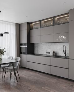 the kitchen is clean and ready to be used for dinner or breakfast time, with modern appliances