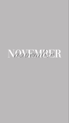 the word november written in white on a gray background