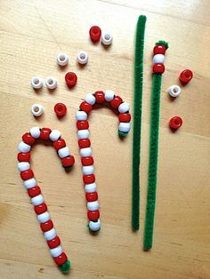 some candy canes and other decorations on a table