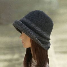 This is white elegant and stylish woman's felt cloche hat. It is soft and warm. This hat is very comfortable and easy to wear. It is a very stylish women's hat that is going to keep you warm in cold days, yet you will look amazing. You can put it on with classic and casual style clothing, so this beautiful hat is very universal. Composition: 100% woolOne size to fit average woman's head.CARE: Hand wash in lukewarm water.  Do not dry in the dryer!Air dry over a balloon or small bowl to retain hat Adjustable Knitted Cloche Hat For Winter, Elegant Knitted Hats For Winter, Winter Brimmed Hat One Size, Winter Felt Brimmed Cloche Hat, Brimmed Felt Cloche Hat For Winter, Gray Brimmed Crochet Hat For Winter, Winter Felt Cloche Hat With Brim, Warm Wool Hats For Fall, One-size Winter Brimmed Hats