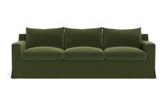 a green couch sitting on top of a white floor