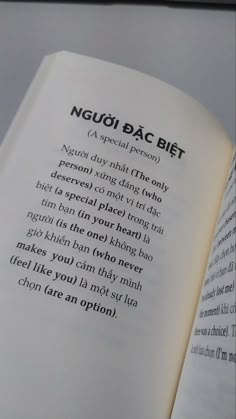 an open book with some type of writing on it's page and the words neuq dac biet