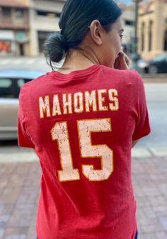 Patrick Mahomes Kansas City Chiefs Red Name And Number Short Sleeve Fashion Player T Shirt - 18240854 Throwback Sports Team Tops, Throwback Team Tops For Sports Events, Red Crew Neck Sublimation Design Jersey For Game Day, Team Name Tops For Baseball Season Fan Events, Baseball Season Tops With Team Name For Fan Events, Red T-shirt For Football Season, Red Fan Apparel Top For Merchandise, Red Fan Apparel Tops, Red Cotton T-shirt For Fan Events