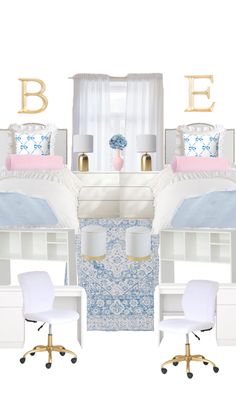 the bedroom is decorated in pastel colors and white furniture with gold letters above it