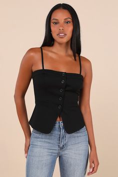 It's official, you'll be the best-dressed cutie on the block with the Lulus Sophisticated Ways Black Button-Front Cami Vest Top! Stretch-knit fabric shapes this too-chic top that features adjustable spaghetti straps (with detachable hooks for a convertible, strapless look) and a straight neckline with hidden no-slip strips. The vest-inspired bodice features decorative welt pockets and a partial, functional button placket at the front, all before ending at pointed hems with a flirty center front Vest Tops Women, Adhesive Bra, Tailored Clothes, Chic Top, Black Vest, Strapless Bra, Black Button, Tank Top Cami, Vest Top