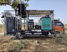 there is a truck that has been built into the ground with its trailer attached to it