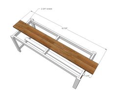 a wooden bench sitting on top of a white table next to a ruler and pencil