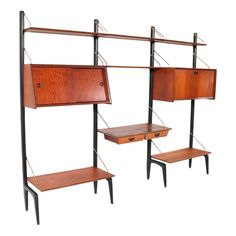 three wooden shelves with two drawers and one shelf