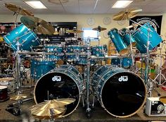 a blue drum set sitting on top of a counter