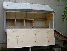 an unfinished shed with the door open