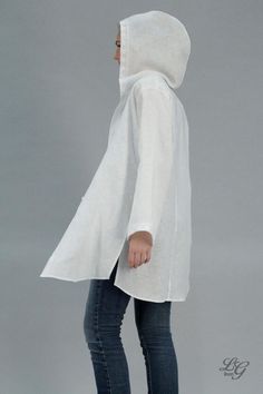 Long linen tunic with oversized hood, flared sleeves and long side splits.On the hood edge and sleeves bottom edges - cotton laces.Front - closure with 4 buttons.That shirt-tunic is ideal wear - gown in summer sunny, windy or rainy day, perfect for your holiday or casual wear.On picture model wears shirt in size S and milky white color linen.For this item I recommend handwashing machine program with delicate detergents and no bleachers.SIZE MEASUREMENTS CHART:SIZE XS; US 0-2; UK 4Bust: fits bust Linen Hoodie, Women Linen Shirt, Relax Outfit, Long Sleeve Shirt Outfits, Linen Tunics For Women, Hooded Long Sleeve Shirt, Measurements Chart, Shirt Linen, Relaxed Outfit