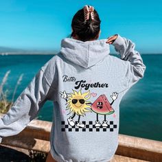 Retro Sunshine and Watermelon Guys Aesthetic Unisex Hoodie. Better Together Motivational Positive Sayings Sweatshirt. This vintage aesthetic hoodie is super soft and cozy and would be perfect gift for a friend or for a mom for mothers day.  Please size up 1 to 3 sizes for an oversized look! This unisex heavy blend hooded sweatshirt is relaxation itself. Made with a thick blend of cotton and polyester, it feels plush, soft  and warm, a perfect choice for any cold day. In the front, the spacious kangaroo pocket adds daily practicality while the hood's drawstring is the same color as the base sweater for extra style points. .: 50% cotton, 50% polyester (fiber content may vary for different colors) .: Medium-heavy fabric (8.0 oz/yd² (271 g/m .: Classic fit .: Tear-away label .: Runs true to si Oversized Cute Hooded Sweatshirt, Cute Oversized Hooded Sweatshirt, Cute Oversized Cotton Hoodie, Oversized Cute Cotton Hoodie, Cute Relaxed Fit Sweatshirt For Streetwear, Cute Oversized Hoodie With Letter Print, Cute Crew Neck Hoodie For Streetwear, Cute Hoodie Sweatshirt For Streetwear, Cute Oversized Hoodie