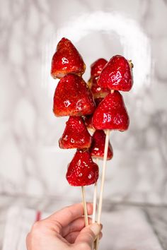 strawberries on sticks with text overlay how to make the tangchuu that's one viral on tiktok