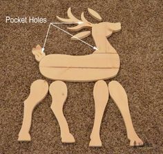 a wooden deer with the words pocket holes on it's side and an arrow pointing to