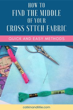 a pair of scissors sitting on top of a piece of fabric with the title how to find the middle of your cross stitch fabric