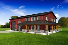 a large red house sitting on top of a lush green field