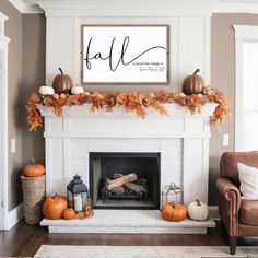 a living room with a fireplace decorated for fall