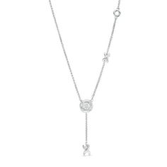 Create a sensation with this sparkling diamond lariat bolo necklace. Crafted in sterling silver, this adjustable style features a round diamond composite in a polished "O" frame - doubling as the bolo clasp. Vary the look by re-centring the bolo design. A polished "X" drop completes the single pull chain. Radiant with 1/20 ct. t.w. of diamonds and a brilliant buffed luster, this romantic wheat chain necklace adjusts up to 26.0 inches in length. Diamond Necklace Gift, Bolo Necklace, Diamond Solitaire Necklace, Peoples Jewellers, Dangle Necklaces, Sparkling Diamond, Solitaire Necklaces, White Gold Necklaces, Pull Chain