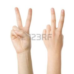 two hands making the v sign with their fingers