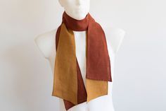 Burnt orange and dusty mustard linen narrow scarves ascot tie set. Handmade accessory.   Could be worn with elegant or casual outfit, under the collar, also as a wedding accessory. At the widest point ~5'' (12,7cm) Length approx. 58'' (147cm) One layered SET of 2 -  Burnt orange and dusty mustard  Fabric: 100% natural linen Care: Machine washable at gentle cycle Contact me for other colors available. Browse for more: www.halfsquares.etsy.com Elegant Yellow Summer Scarf, Ochre Scarf, Yellow Pocket Square, Narrow Scarf, Casual Yellow One-size Scarf, Casual Yellow Scarf, One Size, Ascot Ties, Ties Mens Fashion, Linen Scarves