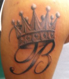 a tattoo with a crown on it