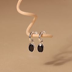 Gold / Silver Dainty Black Onyx Dangle Hoop Earrings ◇ Hoop measures approx.:  Outer diameter: 11mm Inner diameter: 7mm Drop charm: 9mm (handmade earrings vary slightly) ◇ These earrings are sold as pair. ◇These earrings will arrive in an eco-friendly jewelry paper box, making it a nice gift to give a friend or keep for yourself. ◆ View more EARRINGS https://www.etsy.com/shop/eplusfjewelry?section_id=13190709 ◆ View ALL ITEMS https://www.etsy.com/shop/EFHANDMADEJEWELRY shop policies: https://www Dainty Black And Gold Earrings, Black Onyx Hoop Earrings, Dangle Hoop Earrings, Box Making, Earrings Hoop, Eco Friendly Jewelry, Earrings Crystal, Earrings Minimalist, Black Jewelry