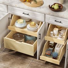 two open drawers in a kitchen with plates and bowls