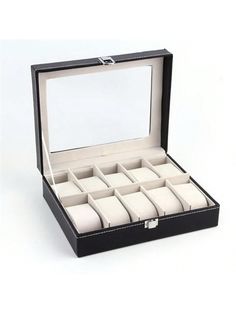 an open watch box with twelve watches in it on a white background, there is no image here to provide a caption for