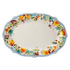 an oval platter with colorful flowers on it