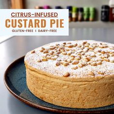 a close up of a cake on a plate with the words citrus - infused custard pie