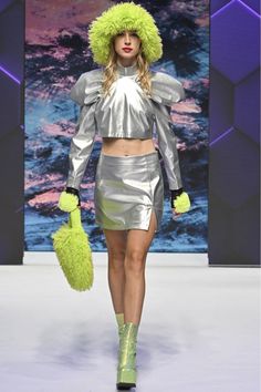 Part of our metallic collection this mini skirt co-ord featuring a split is crafted from our gorgeous eco-leather    12% Elastane 88% viscose Year 3000, Faux Fur Bag, Fur Gloves, Fur Headband, Catwalk Collection, Faux Fur Scarves, Cashmere Gloves, Faux Leather Mini Skirt, Leather Mini Skirt