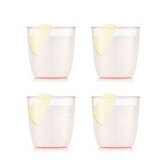 four glasses filled with lemonade and ice on top of each other in front of a white background