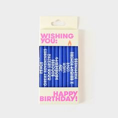 four blue birthday candles in a package with the words wishing you happy birthday written on them