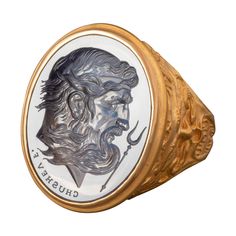 This exquisite intaglio is engraved onto man made blue sapphire and features Hades, king of the underworld and ruler of the dead.. The stone is set in an 18K signet ring. Production time for this piece is 12-14 weeks. Can be made in any size ranging from 6-12. Chavdar Chushev is an artist, restorer, jeweler, and master of the ancient art of gem carving. His extensive knowledge of gemstones and precious metals is complimented by a familiarity with more unusual materials, such as exotic woods, org Luxury Elegant Sapphire Signet Ring, Luxury Engraved Ring With Polished Finish For Commemoration, Luxury Engraved Ring For Commemoration With Polished Finish, Heirloom Engraved Ring With Intaglio For Collectors, Luxury Engraved Signet Ring Collectible, Luxury Intaglio Rings For Collectors, Luxury Engraved Signet Ring For Commemoration, Luxury Ceremonial Signet Ring With Intaglio, Collectible Gold Intaglio Engraved Ring