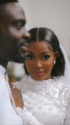 a bride and groom posing for a photo