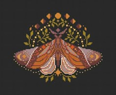 a cross stitched picture of a moth with flowers on it's back ground