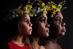 three women with flower crowns on their heads