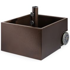 a brown box with a clock on the side and wheels attached to it, sitting in front of a white background