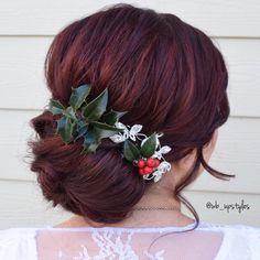 Beautiful low bun with a Christmas wreath hair accessory. Get ready for the holidays with these 10 gorgeous holiday hairstyles! From Christmas hair inspo to chic ponytails, curls, and festive hair ideas, these looks are perfect for any celebration. Whether you need last-minute glam or creative hair ideas, you'll love these trending styles! 🎀✨ #HolidayHairstyles #ChristmasHair #HairInspo #HairIdeas #FestiveLooks