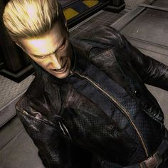 a man with blonde hair and black leather jacket