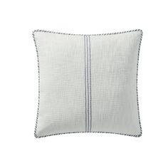 a white pillow with blue trim