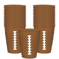 three brown paper cups with football designs on them