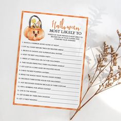 a printable halloween most likely to list on a white surface with dried flowers and leaves