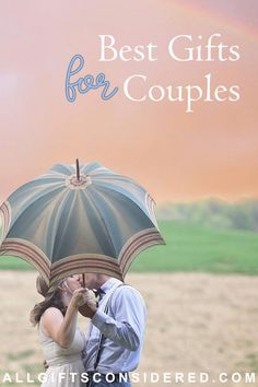 a man and woman kissing under an umbrella with the words best gifts for couples above them