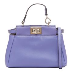 FENDI Micro Peekaboo purple leather turnlock mini crossbody satchel bag Reference: LNKO/A02356 Brand: Fendi Model: Peekaboo Micro Material: Leather Color: Purple, Silver Pattern: Solid Closure: Turnlock Lining: Grey Leather Extra Details: Purple Leather. Silver-Tone Hardware. Flat Handle & Single Adjustable Shoulder Strap. Chain-Link Accents. Microfiber Lining. Turn-Lock & Snap Closures at Top. Made in: Italy CONDITION: Condition: Good, this item was pre-owned and is in good condition. Please re Peekaboo Purple, Fendi Micro Peekaboo, Bag Reference, Crossbody Satchel, Purple Leather, Leather Silver, Mini Crossbody, Satchel Bag, Bag Women