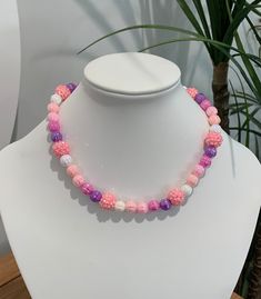 Sugar Berries Necklace As sweet as sugar berries this pretty necklace has iridescent melon beads and pretty pink rhinestones.  Custom orders welcome.  Handmade in Adelaide, Australia with 💖 and a little attitude. Pink Beaded Charm Necklace With Round Beads, Pink Beaded Charm Necklaces With Round Beads, Pink Round Bead Necklace For Gifts, Pink Round Beads Necklace For Gifts, Pink Round Beaded Necklace For Gift, Pink Beaded Necklace With Round Beads For Gifts, Cute Pink Heart Beaded Necklaces, Adjustable Pink Kawaii Jewelry, Cute Adjustable Pink Necklaces