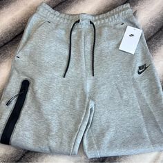 Nike Tech Fleece Dark Grey Heather Black Pants Sweatpants Nwt Msrp $120 Womens Size: S Or M Brand New Never Worn With Tags Have The Matching Sweatshirt In A Separate Listing- Bundle To Save Have Multiple Sizes, Got A Full Size Run In These: Xs, S, M, L And Xl Also Have In Black Have Mens As Well- Along With A Ton Of Other Sportswear Brands Accepting Offers Nike Tech Sweatpants, Grey Nike Tracksuit, Gray Nike Sweatpants, Nike Track Pants Mens, Athletic Pants Womens, Grey Nike Joggers, Grey Nike Sweatpants, Bday Gifts, Track Pants Mens