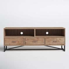 the sideboard is made from wood and has three drawers on each side, one with two