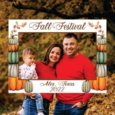 a couple and their baby are posing for a fall festival photo